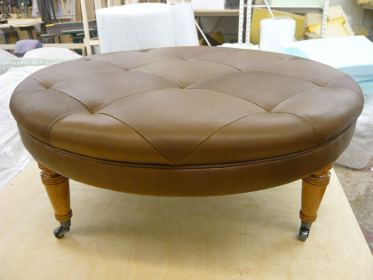 Leather Round Ottoman with Cut and Stitched Pattern